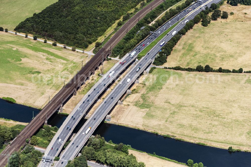 Duisburg from the bird's eye view: routing and traffic lanes over the highway bridge in the motorway bridge of the BAB A3 and railway bridge about the Ruhr in Duisburg in the state North Rhine-Westphalia, Germany