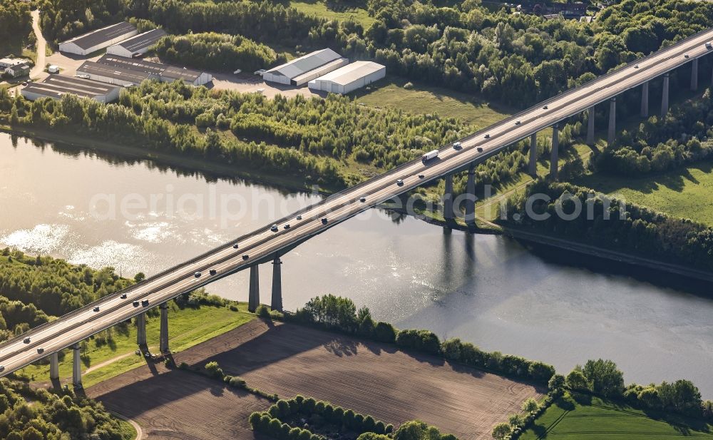 Aerial image Rade - Routing and traffic lanes over the highway bridge in the motorway A 7 in Rade in the state Schleswig-Holstein, Germany