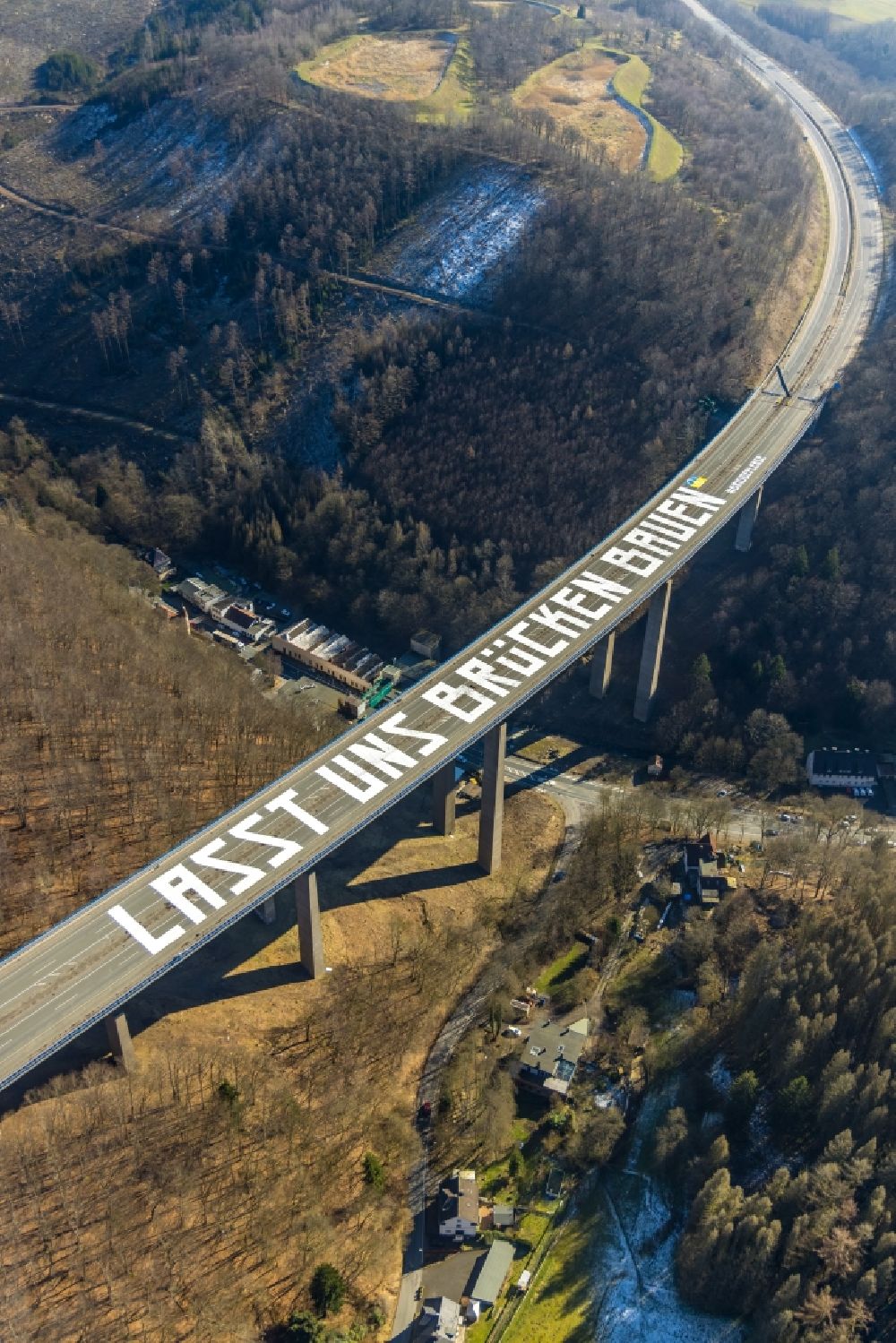 Aerial photograph Oberrahmede - Lettering Let us build bridges (LASST UNS BRUeCKEN BAUEN) on the locked Autobahn bridge of the BAB A45 Talbruecke Rahmede in Oberrahmede in the state North Rhine-Westphalia, Germany