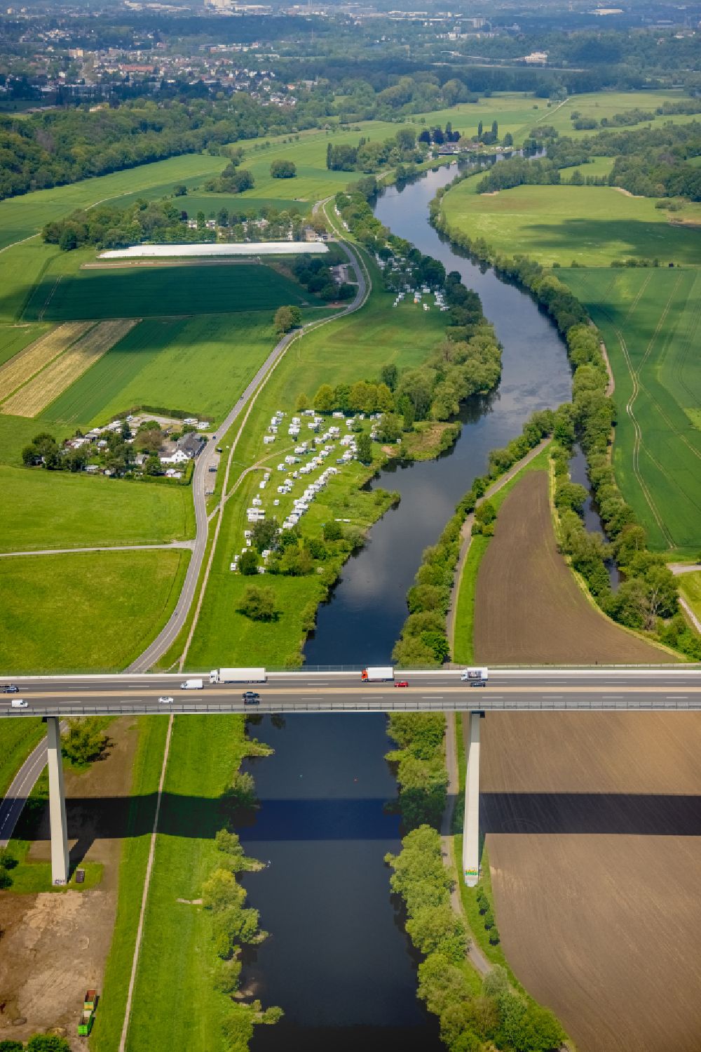 Mintard from above - routing and traffic lanes over the highway bridge in the motorway A 52 over the shore of river Ruhr in Muelheim on the Ruhr in the state North Rhine-Westphalia, Germany