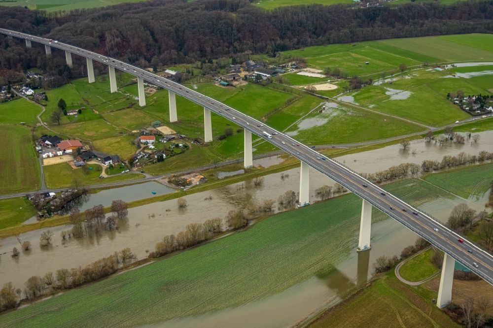 Mintard from above - Routing and traffic lanes over the highway bridge in the motorway A 52 over the shore of river Ruhr in Muelheim on the Ruhr in the state North Rhine-Westphalia, Germany