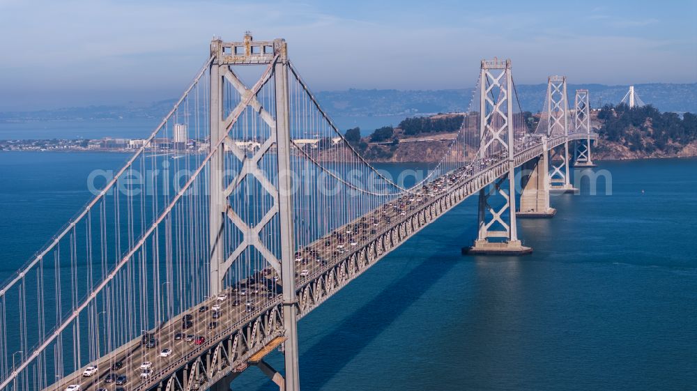 San Francisco from above - Routing and traffic lanes over the highway bridge in the motorway San Francisco - Oakland Bay Bridge on street San Francisco - Oakland Bay Bridge in San Francisco in California, United States of America