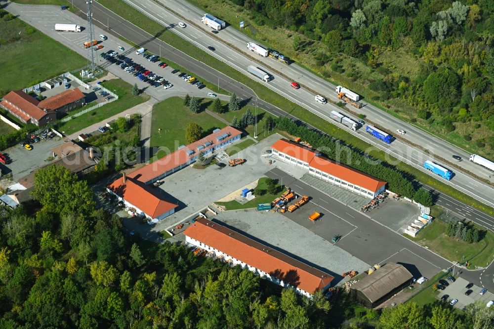 Hohe Börde from above - Motorway parking lot and parking area for automobiles with rest area on the edge of the course of the BAB A 2 with the Bundesautobahn-Polizeirevier Boerde and the Autobahnmeisterei Boerde in the district Hohenwarsleben in Hohe Boerde in the state Saxony-Anhalt, Germany