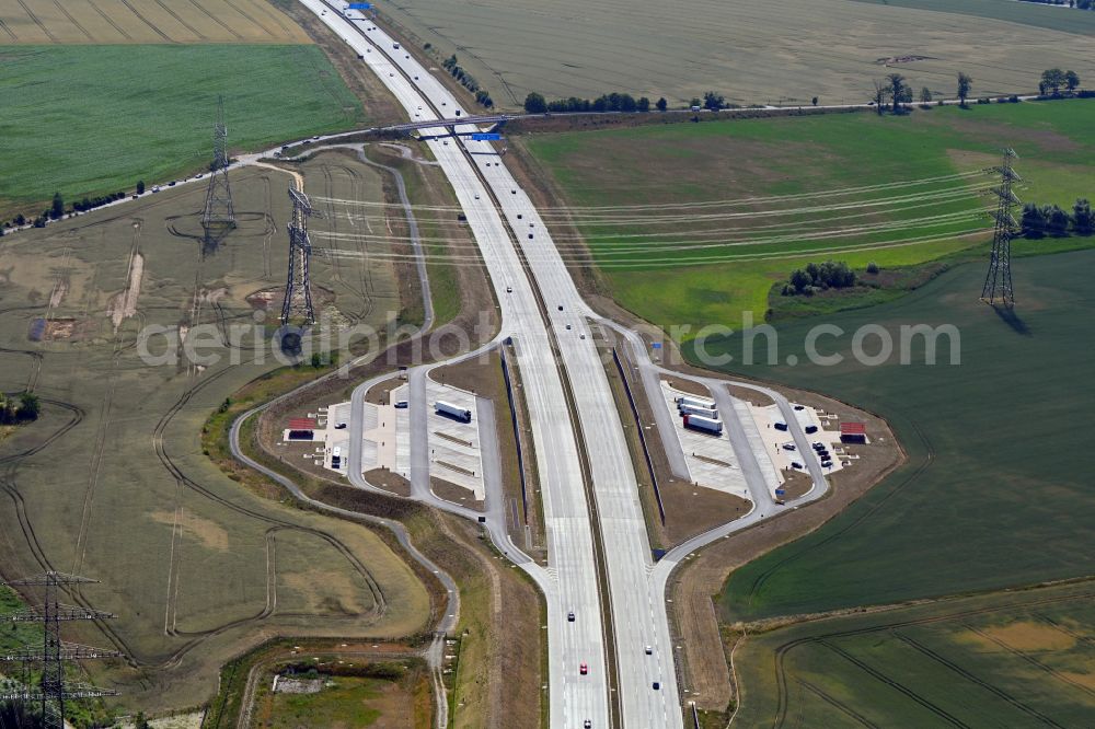 Aerial photograph Panketal - Motorway parking lot and storage area for automobiles with a rest area and toilet for short stays on the edge of the course of the A10 motorway Kappgraben Nord and Kappgraben Sued in Panketal in the state Brandenburg, Germany