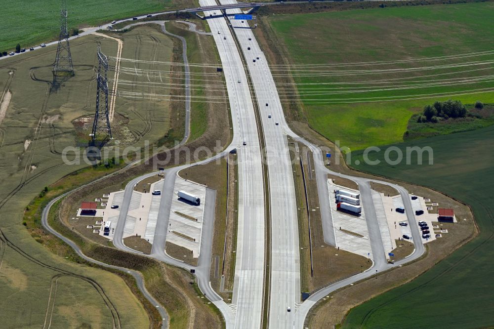 Panketal from above - Motorway parking lot and storage area for automobiles with a rest area and toilet for short stays on the edge of the course of the A10 motorway Kappgraben Nord and Kappgraben Sued in Panketal in the state Brandenburg, Germany