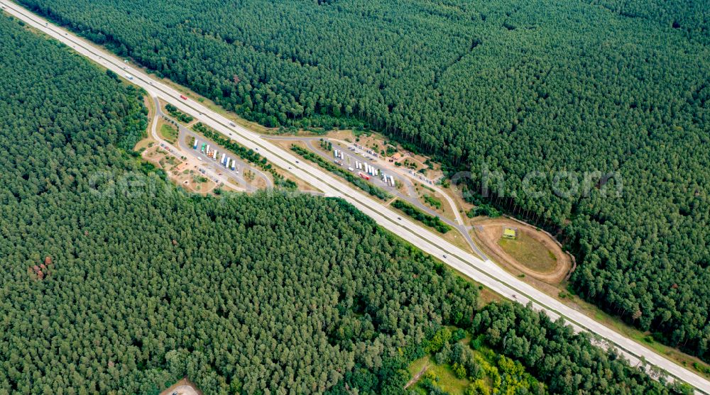 Bernau from the bird's eye view: Motorway parking lot and parking area for automobiles with rest area and toilet for short stays on the edge of the course of the BAB A11 Ladeburger Heide in Bernau in the state Brandenburg, Germany