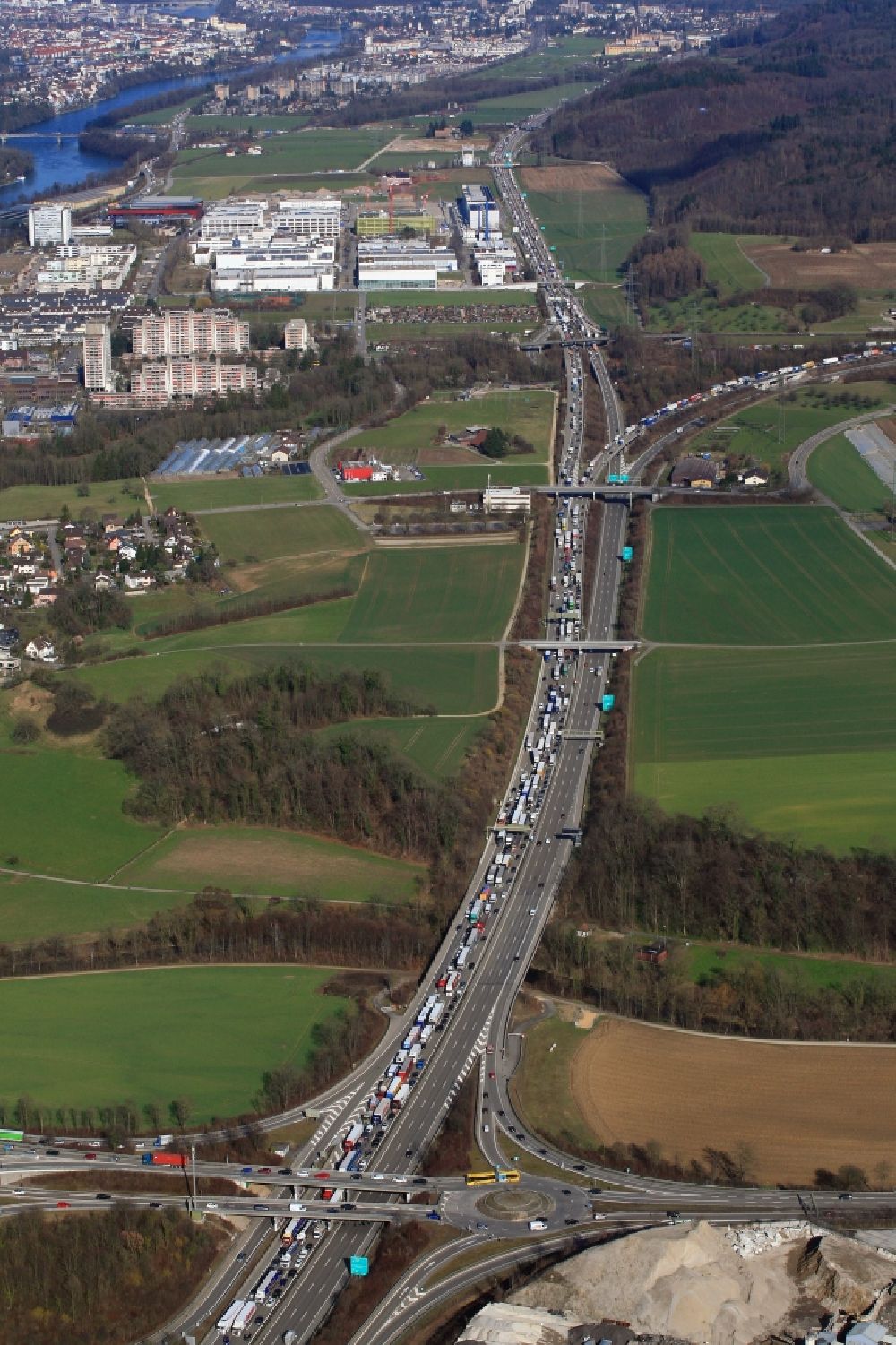 Pratteln from the bird's eye view: Highway congestion along the route of the lanes of motorway A3 in Pratteln in the canton Basel-Landschaft, Switzerland