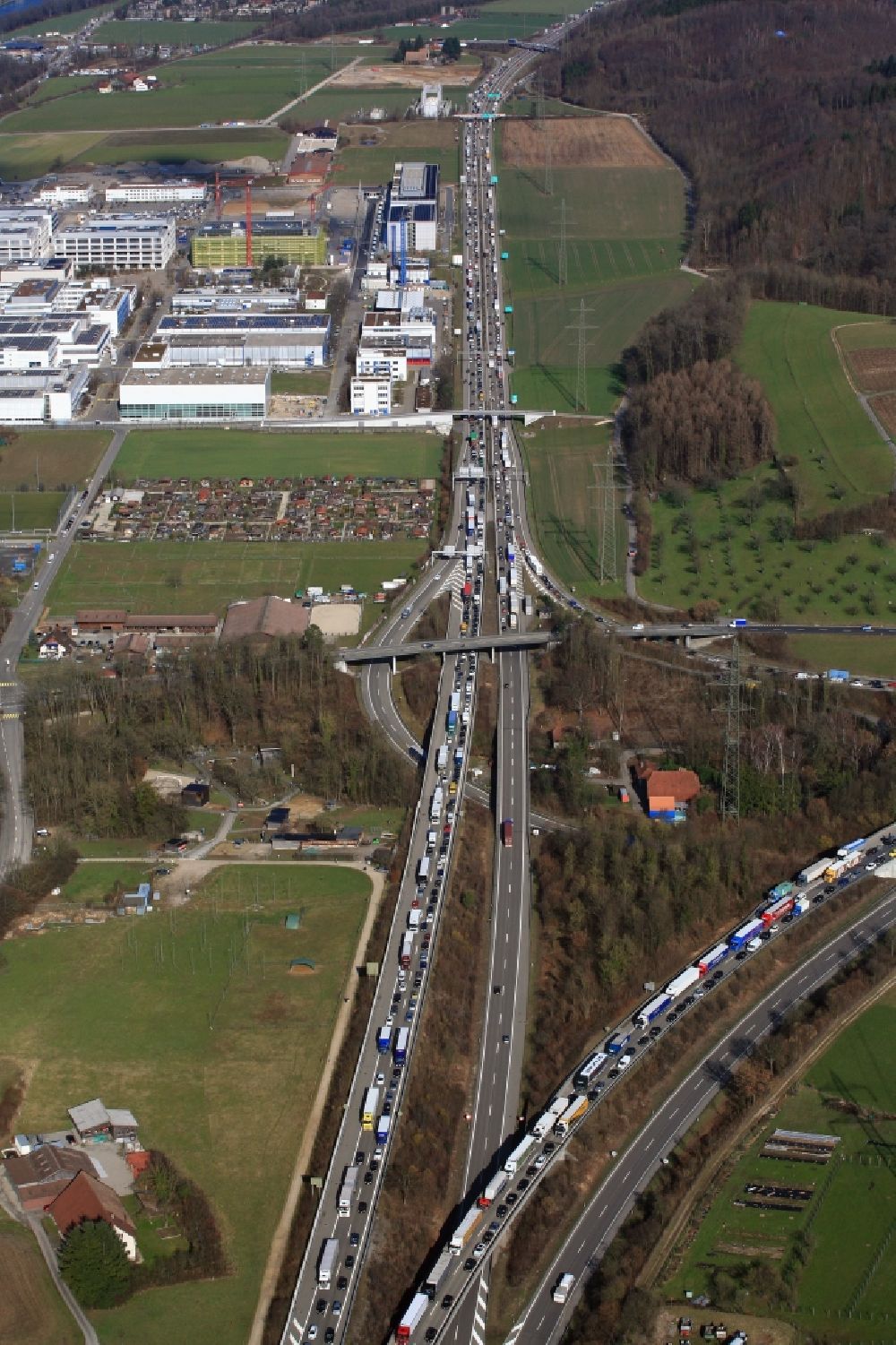 Augst from the bird's eye view: Highway congestion along the route of the lanes of motorway junction A3 / A2 in Augst in the canton Basel-Landschaft, Switzerland