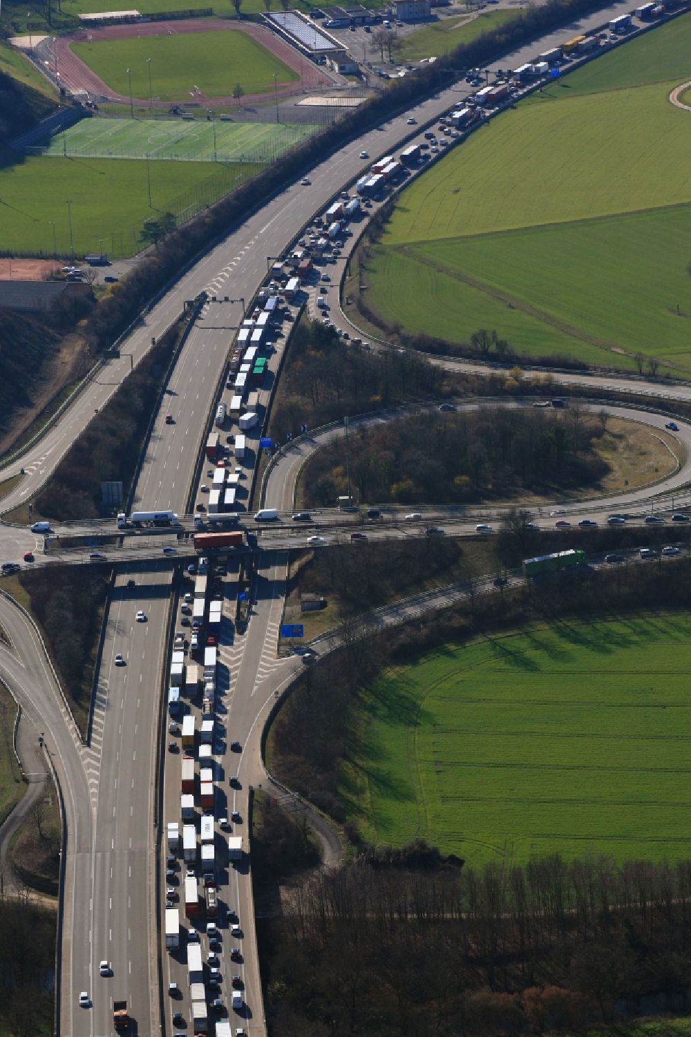 Aerial photograph Pratteln - Highway congestion along the route of the lanes of motorway A3 direction Basle in Pratteln in the canton Basel-Landschaft, Switzerland