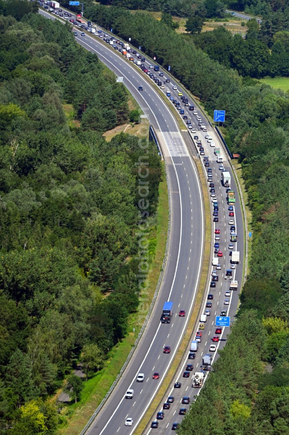 Hohenschöpping from above - Highway congestion along the route of the lanes BAB A111 in Hohenschoepping in the state Brandenburg, Germany