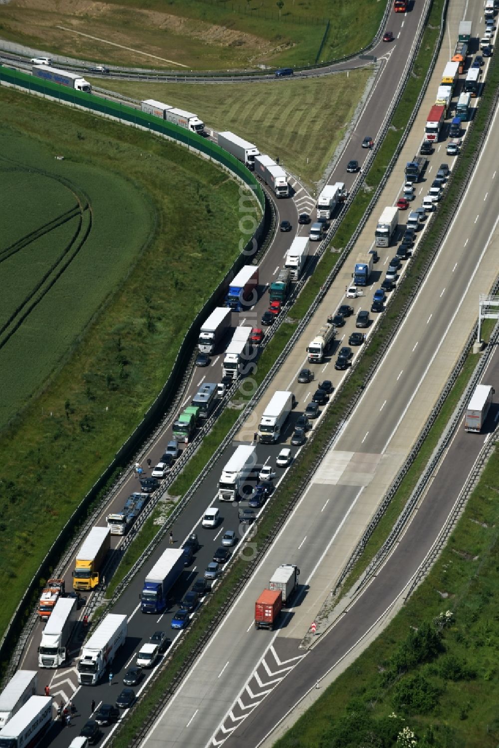 Ilberstedt from above - Highway jam along the route of the lanes A14 at the departure Bernburg in Ilberstedt in the state Saxony-Anhalt