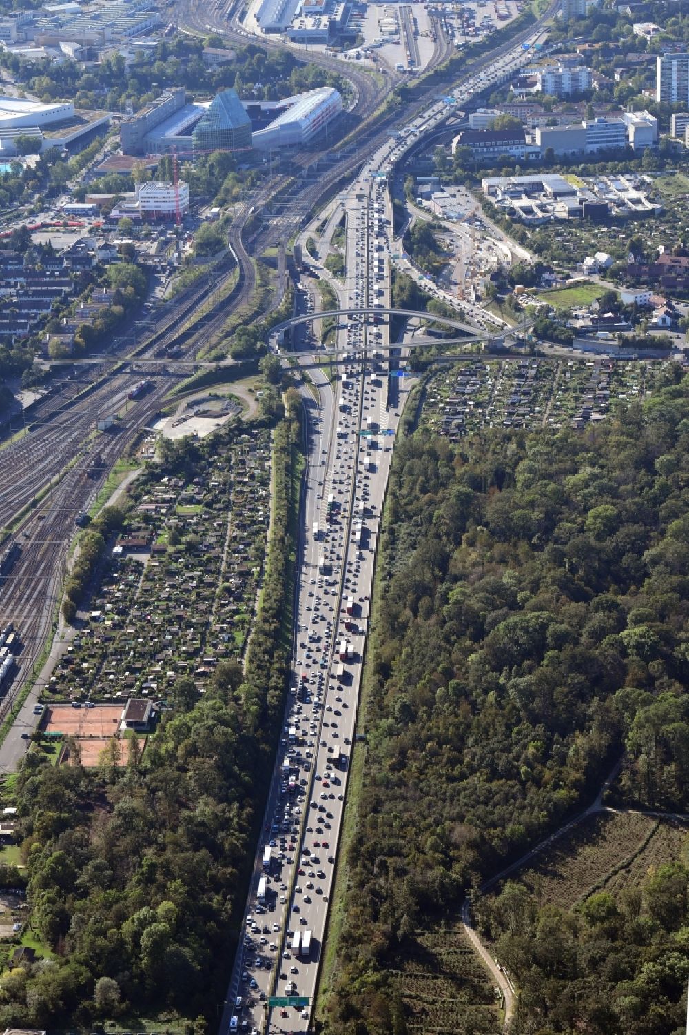 Aerial photograph Muttenz - Highway congestion along the route of the lanes of the swiss motorway A2 / A3Autobahn in Muttenz in the canton Basel-Landschaft, Switzerland