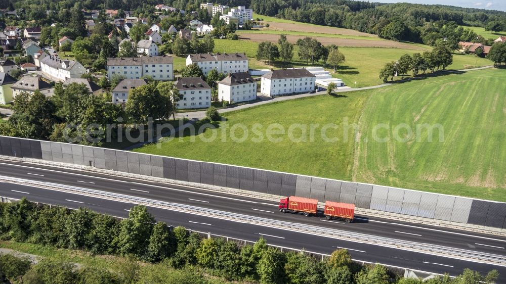Weiden in der Oberpfalz from the bird's eye view: Highway route A 93 with noise protection wall in the district Nuremberg Metropolitan Area in Weiden in der Oberpfalz in the state Bavaria
