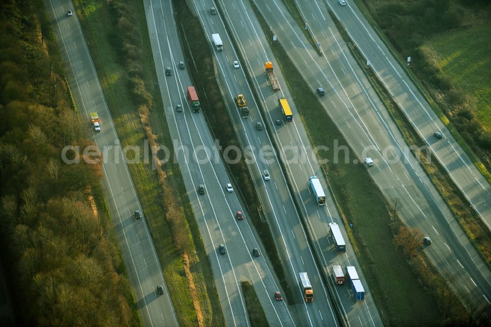 Barsbüttel from the bird's eye view: Lanes of the motorway- route and course of the A1 and A24 in Barsbuettel in the state Schleswig-Holstein, Germany