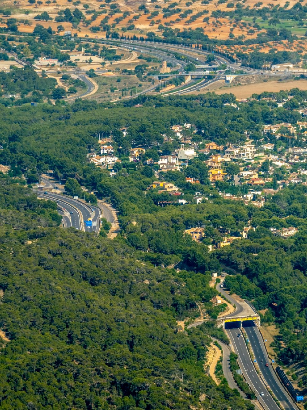 Aerial photograph Andratx - Routing and traffic lanes during the highway tunnel construction of the motorway A on street Ma-1 in Andratx in Balearic island of Mallorca, Spain