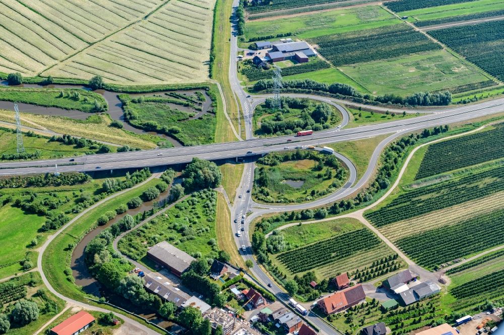 Horneburg from above - Routing and lanes in the course of the motorway exit and access to the BAB A26 in Horneburg in the state Lower Saxony, Germany