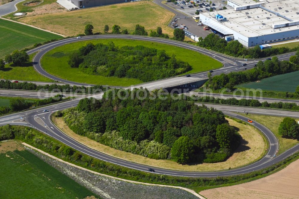 Wölfersheim from above - Routing and traffic lanes during the highway exit and access the motorway A 45 in Woelfersheim in the state Hesse, Germany