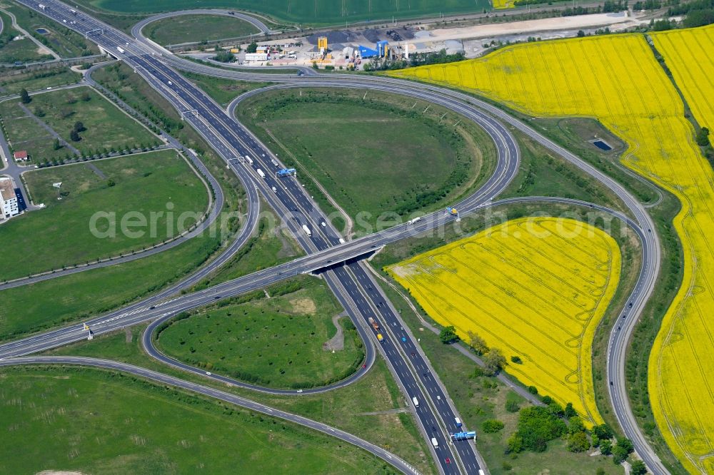Schönefeld from the bird's eye view: Highway triangle the federal motorway A 113 in Schoenefeld in the state Brandenburg, Germany
