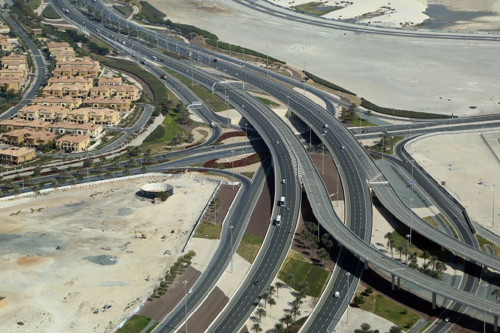 Abu Dhabi from above - Highway triangle of the federal motorway Sheikh Khalifa Bin Zayed Highway on the Saadyat in Abu Dhabi in United Arab Emirates