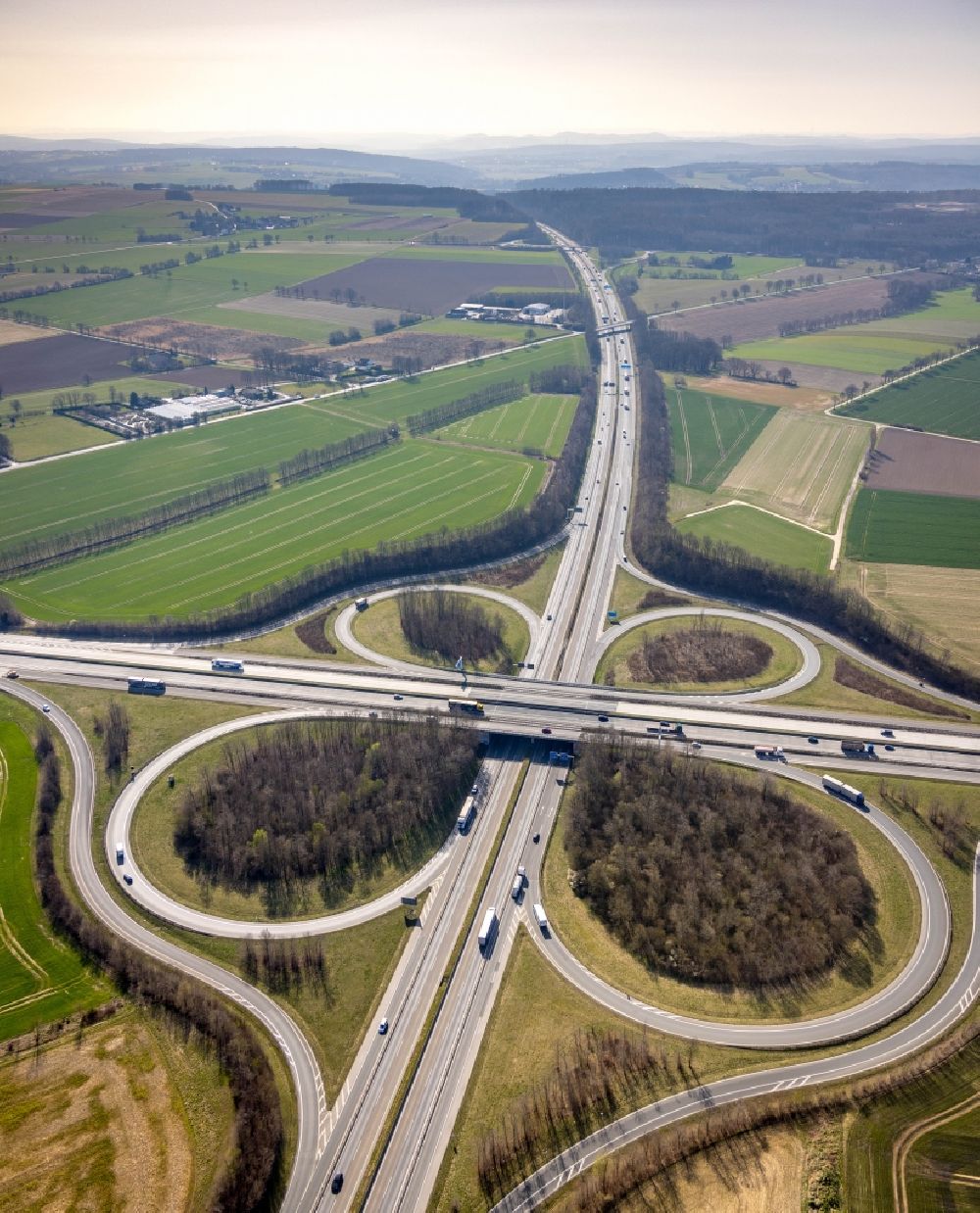 Aerial image Werl - Traffic flow at the intersection- motorway A44 - BAB 445 in form of cloverleaf in Werl at Ruhrgebiet in the state North Rhine-Westphalia, Germany