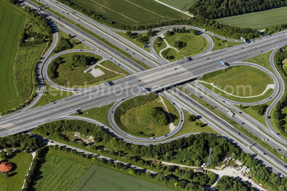 Heimstetten from above - Traffic flow at the intersection- motorway A94 - 99 Kreuz Muenchen-Ost in form of cloverleaf in Heimstetten in the state Bavaria, Germany