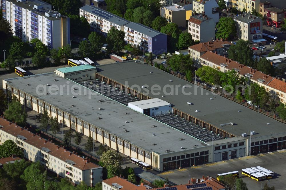 Berlin from the bird's eye view: In the Grade street in Stadtbezitk Neukoelln of Berlin there is the bus depot Britz. In the hall several hundred buses of BvG be prepared and waiting for their transport rides in the south of Berlin daily