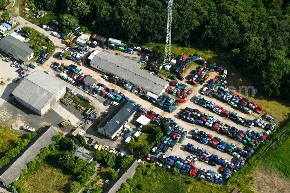 Aerial photograph Falkenberg - Scrapyard for recycling of cars cars and used vehicles with decomposition and aftermarket Autoverwertung Domke-Krause in Gewerbegebiet in Falkenberg in the state Brandenburg, Germany