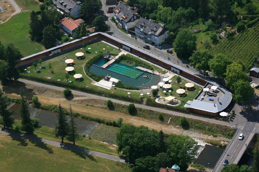 Aerial photograph Riehen - Bathers on the lawn by the pool of the swimming pool Naturbad Riehen in Riehen in the canton Basel, Switzerland