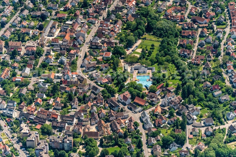 Sankt Georgen from above - Bathers on the lawn by the pool of the swimming pool and Ortsansicht Freiburg in Sankt Georgen in the state Baden-Wurttemberg, Germany