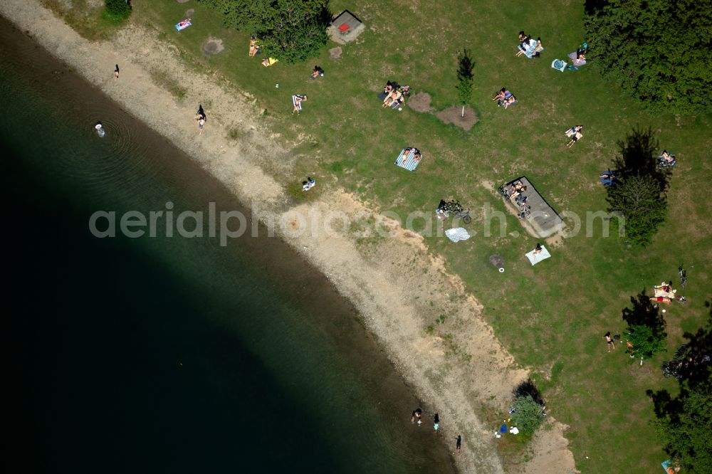 Freiburg im Breisgau from above - Bathers look to cool off in summer on the banks of the lake Dietenbachsee in the district Weingarten in Freiburg im Breisgau in the state Baden-Wuerttemberg, Germany