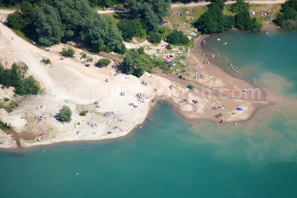 Aerial image Rosdorf - Bathers look to cool off in summer on the banks of the lake in Rosdorf in the state Lower Saxony, Germany