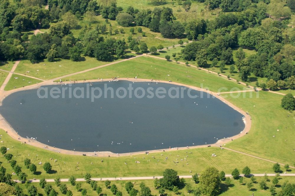 Aerial image London - View of the Round Pond lake in London's Hyde Park, Hyde Park is a public park in central London. The city park is known together with the other Royal Parks, the green lung of the city and is considered one of the largest and most famous city parks