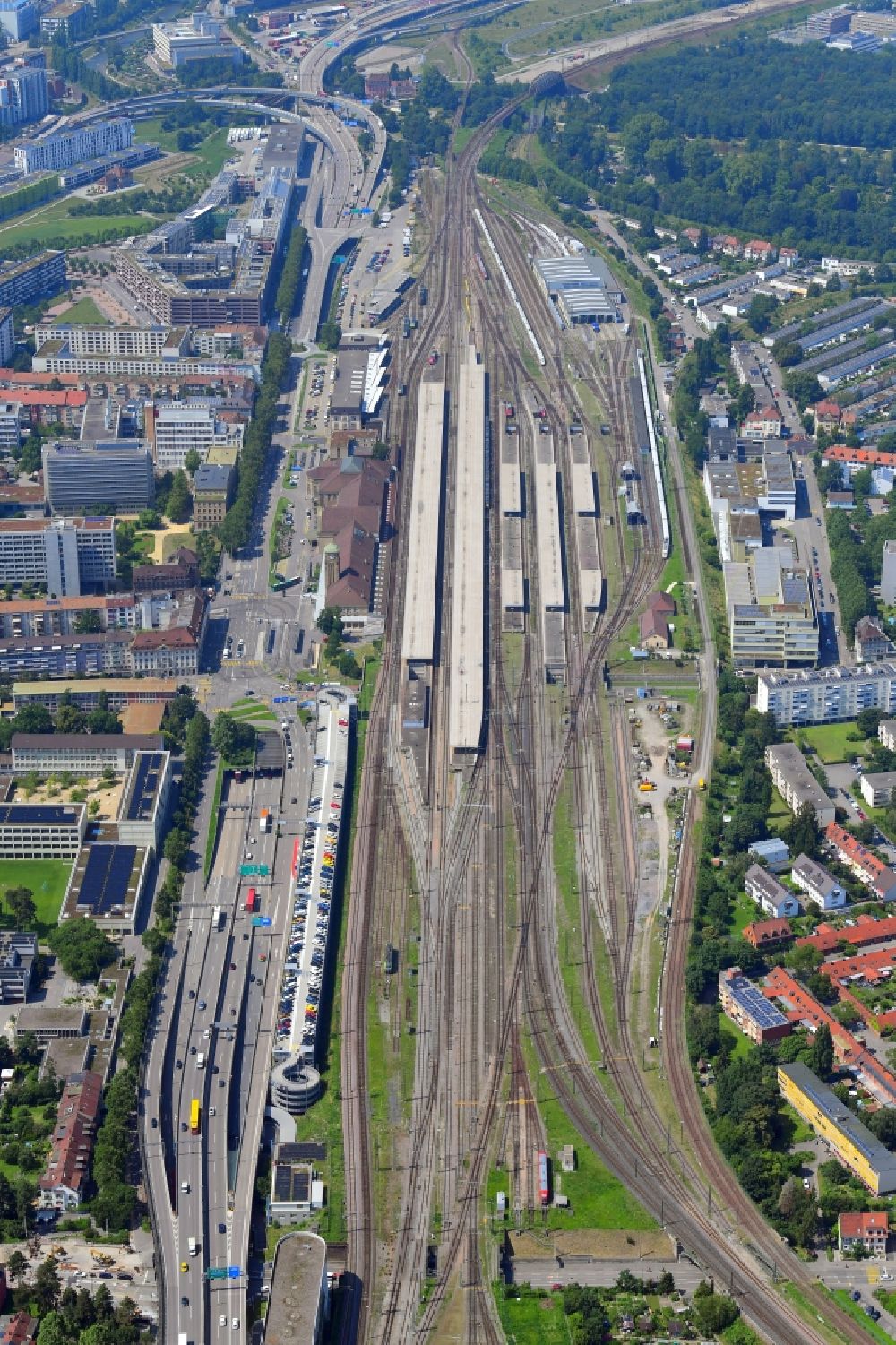 Aerial image Basel - Tracks and buildings of the international station Badischer Bahnhof next to the motorway A3 in Basel, Switzerland