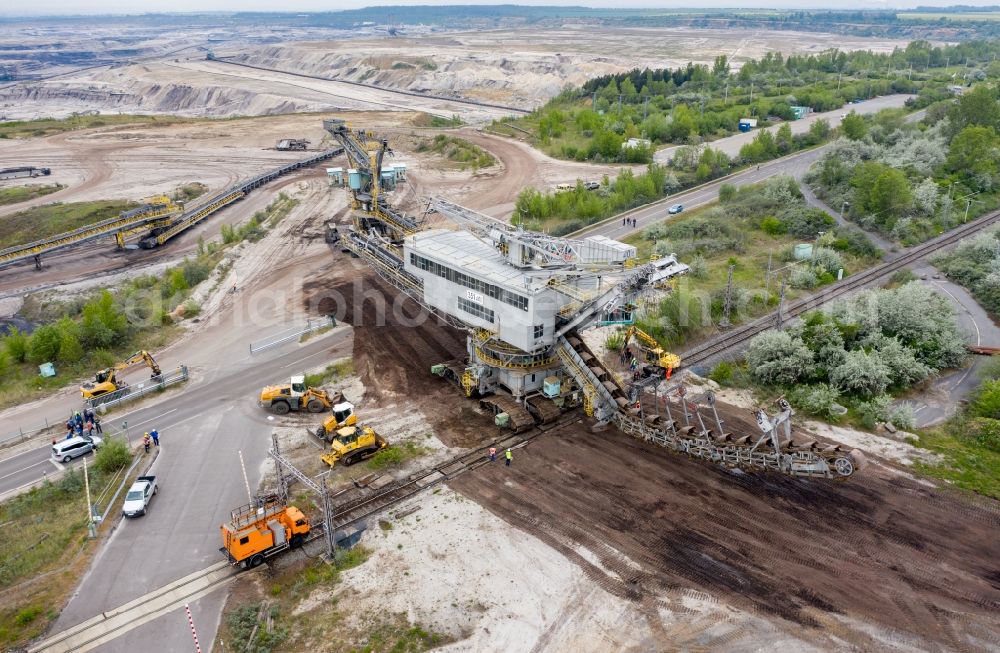 Aerial image Profen - Dredging conveyor bridge in brown coal mine beim Umsetzen ueber eine Landstrasse and Bahnlinie in Profen in the state Saxony-Anhalt, Germany