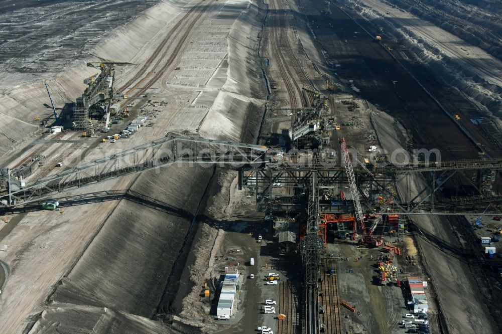 Aerial photograph Nochten - Dredging conveyor bridge in brown coal mine der Vattenfall Europe Sales GmbH in Nochten in the state Saxony. The company TAKRAF GmbH - Tenova exchanged at Greater excavator with a roller table of the great rocker of the 40-year-old excavator