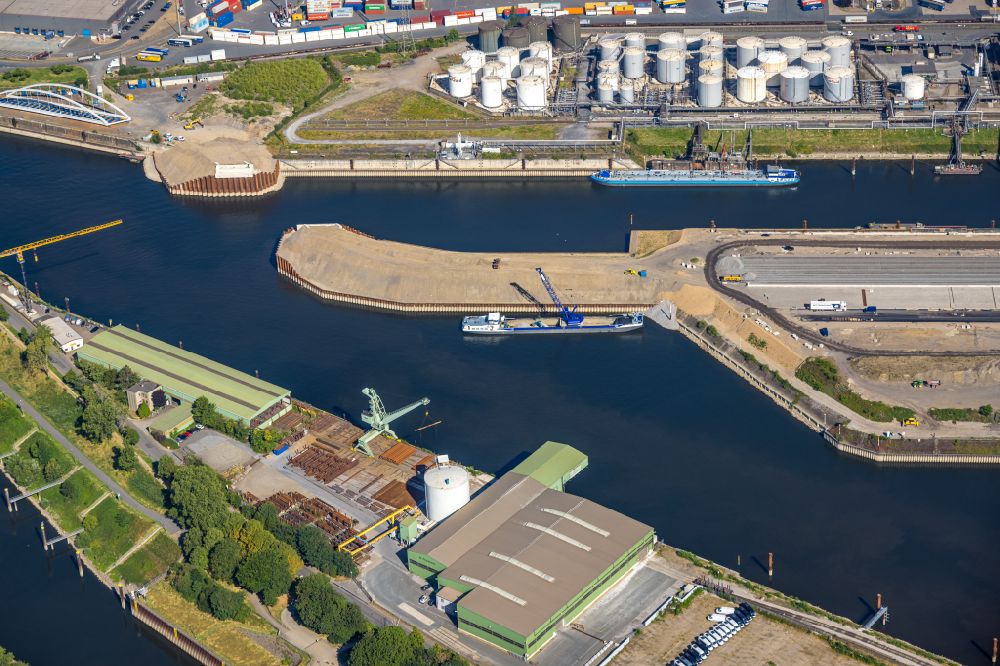 Aerial image Duisburg - Dredging work on the coal island in the port of Duisburg in the Ruhr area in the state of North Rhine-Westphalia, Germany