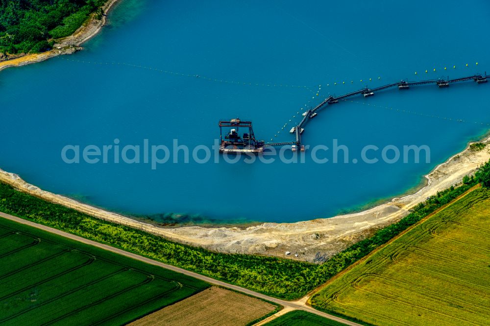 Lahr/Schwarzwald from the bird's eye view: Lake shore and overburden areas of the quarry lake and gravel open pit Schwimmbagger in Waldmatten See in Lahr/Schwarzwald in the state Baden-Wuerttemberg, Germany