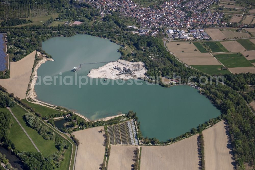 Wintersdorf from above - Lake shore and overburden areas of the quarry lake and gravel open pit in Wintersdorf in the state Baden-Wuerttemberg, Germany