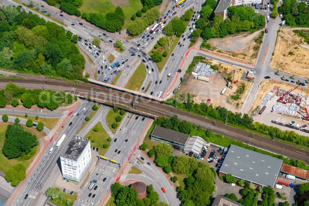 Hamburg from the bird's eye view: Railway bridge building to route the train tracks and road junction Billhorner Brueckenstrasse and Amsinckstrasse in Hamburg, Germany