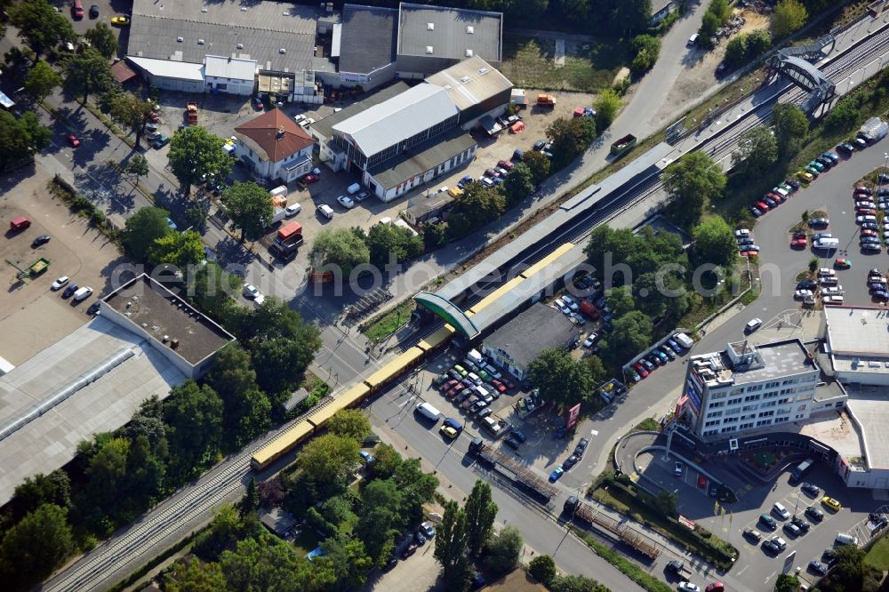 Berlin from above - Crossing Buckower Chaussee at the railway line Dresdner Bahn to the same S-Bahn station in Berlin