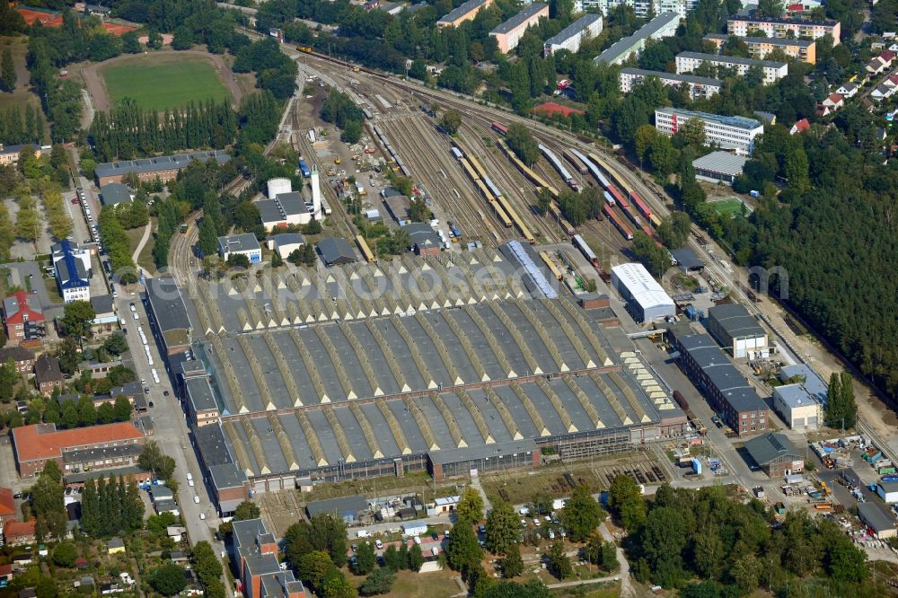 Aerial image Berlin - Railway depot and repair shop for maintenance and repair of trains of passenger transport of the series of S- Bahn in the district Schoeneweide in Berlin, Germany