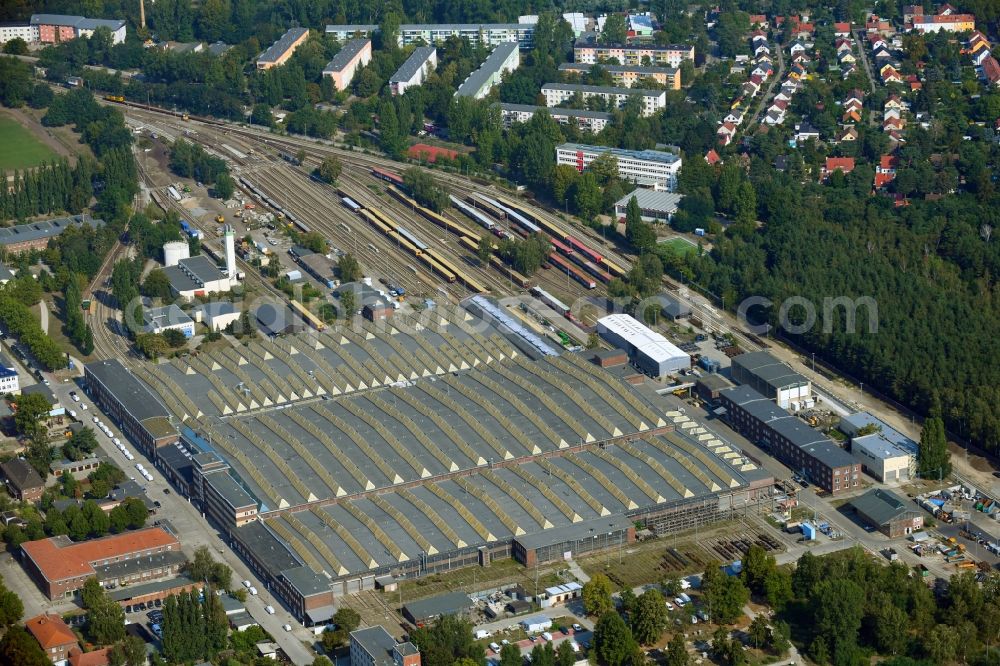Aerial photograph Berlin - Railway depot and repair shop for maintenance and repair of trains of passenger transport of the series of S- Bahn in the district Schoeneweide in Berlin, Germany