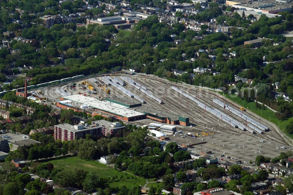 Aerial image Toronto - Railway depot and repair shop for maintenance and repair of trains of passenger transport of the series of TTC Greenwood Yard on Greenwood Ave in Toronto in Ontario, Canada