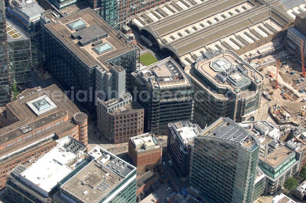 London from above - View at the Liverpool Street Station and surrounding commercial buildings in the the district City of London in London in the county of Greater London in the UK. The underground situated Liverpool Street Station is one of the main stations in London. The trains running from here to the East of England are almost all operated by the Abellio Greater Anglia Ltd