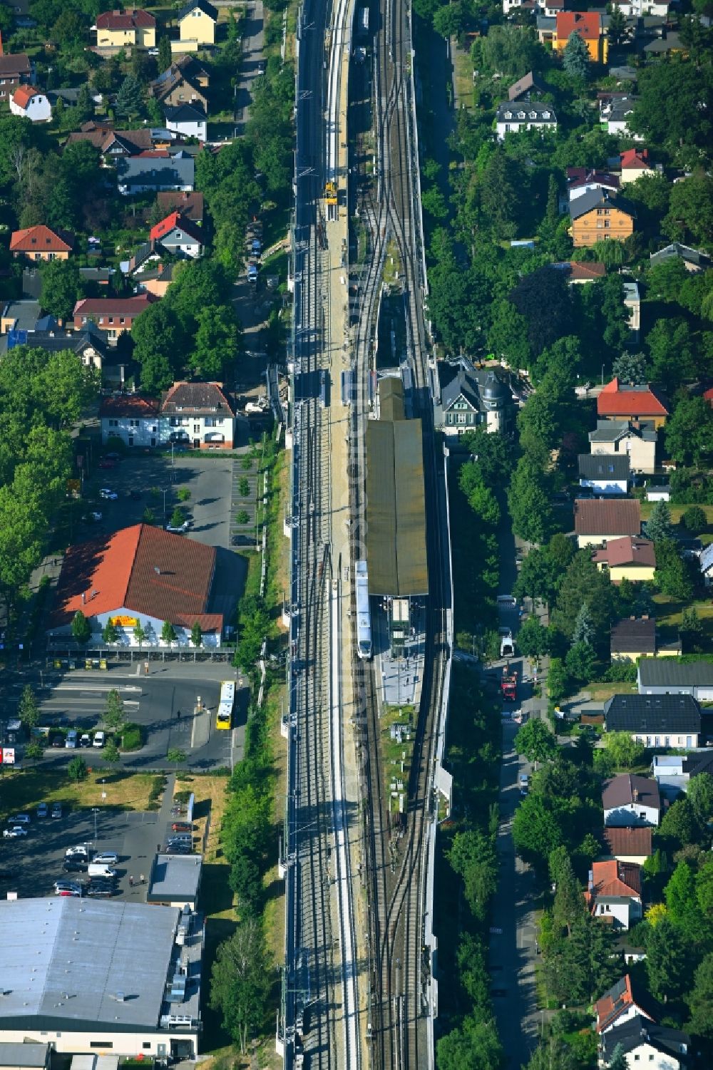 Aerial image Berlin - Station building and track systems of the S-Bahn station Karow in the district Karow in Berlin, Germany