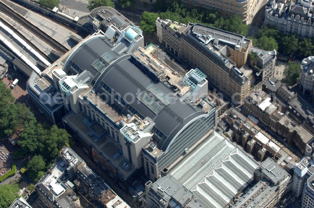 Aerial photograph London - Sight on the Charing Cross railway station in the London borough City of Westminster in the centre of London. The railway station Charing Cross is the fifth busiest rail terminal of London
