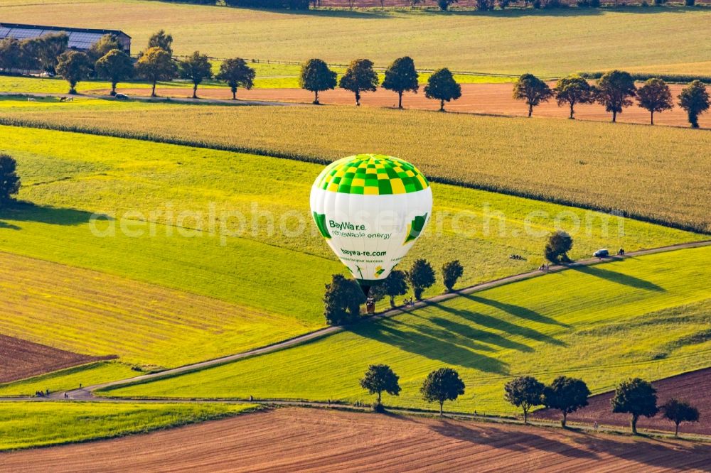 Warstein from above - Hot air balloons at balloon festival Warsteiner Internationale Montgolfiade flying over the airspace in Warstein in the state North Rhine-Westphalia, Germany