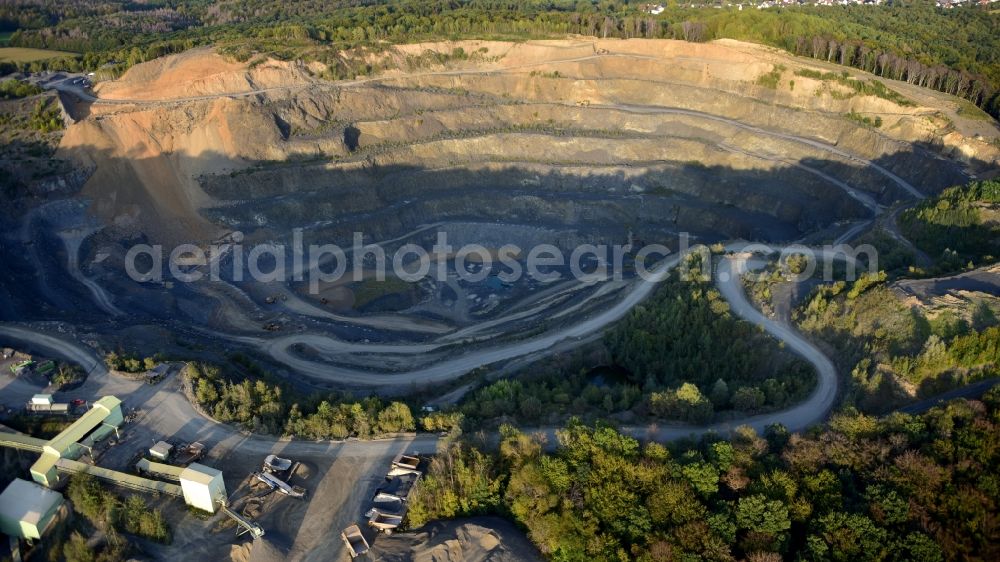 Aerial photograph Königswinter - Basalt quarry Huehnerberg of the Rheinische Provinzial-Basalt- und Lavawerke GmbH & Co. oHG, Huehnerberg plant in the state North Rhine-Westphalia, Germany