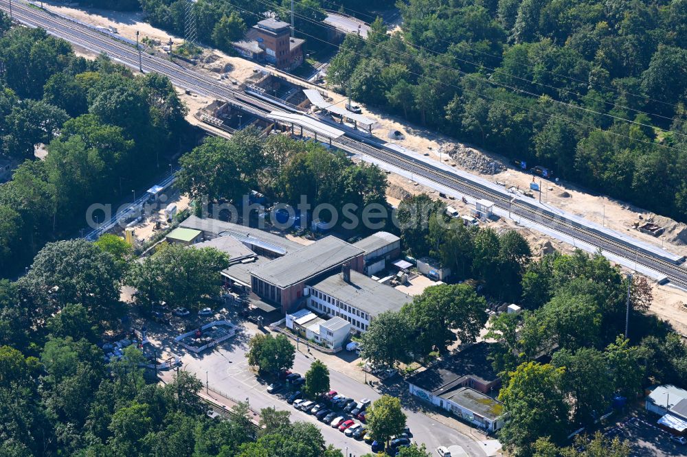 Potsdam from the bird's eye view: Construction work to convert the track of the Pirschheide train station to the Potsdam-Pirschheide railway junction on the road to the Pirschheide train station in the Wildpark district in Potsdam in the state Brandenburg, Germany