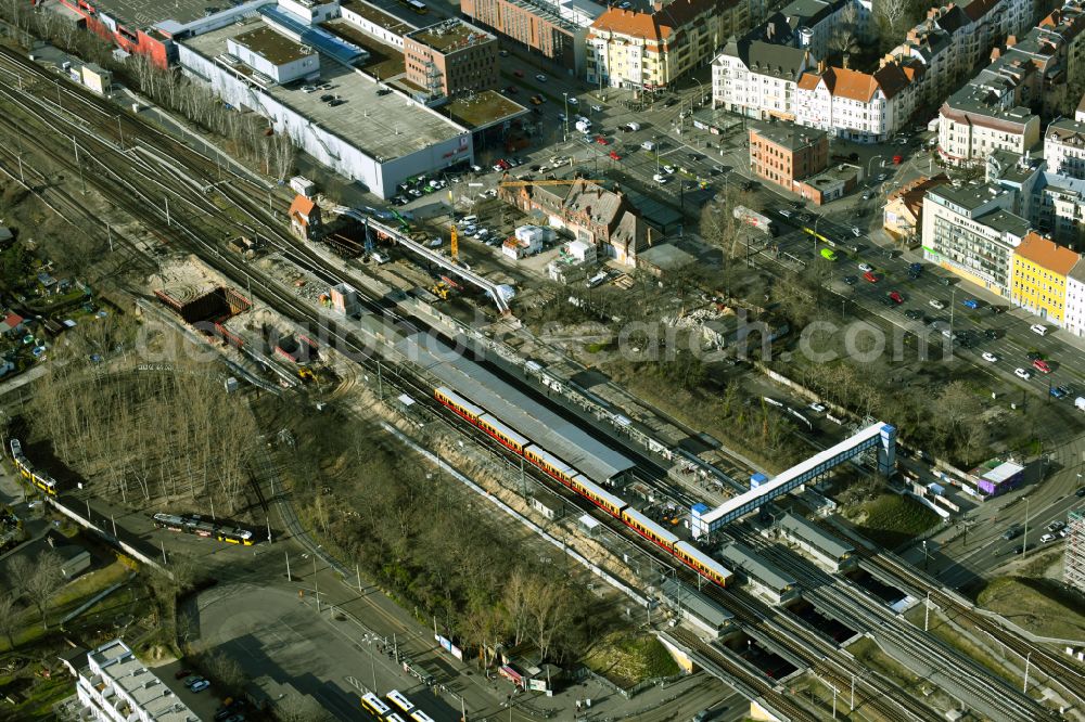 Aerial photograph Berlin - Construction work for the reconstruction of the station building of S-Bahnhof Schoeneweide in the district Niederschoeneweide in Berlin, Germany